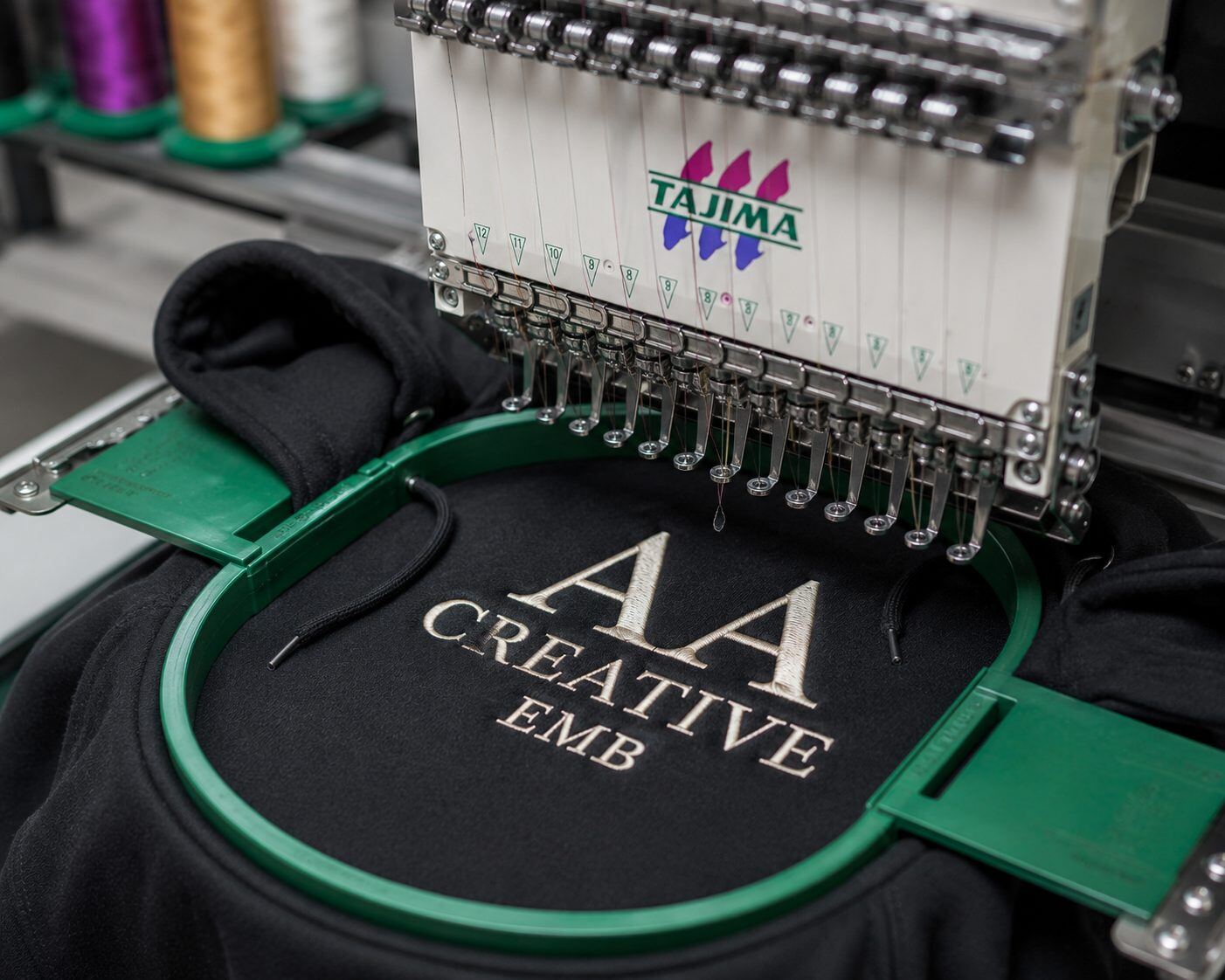 Hoodie embroidery digitizing sample - Tajima machine stitching AA Creative Emb logo